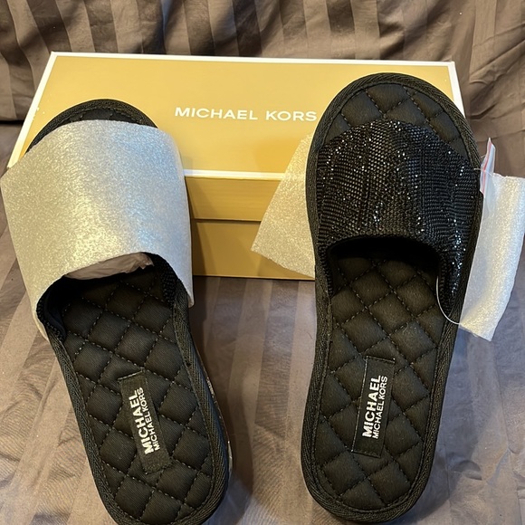 Michael Kors Shoes - New in the box Michael Kors Janis Slide in black. Size 9